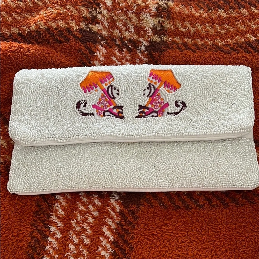 Embroidered Cream Clutch by Lisi Lerch - Picture 1 of 6